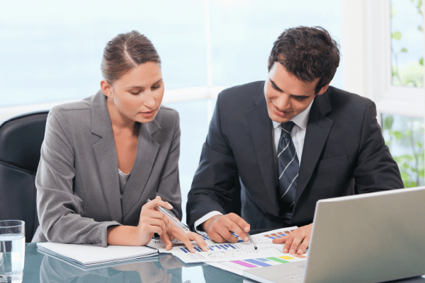 Colleagues working together in an office-01