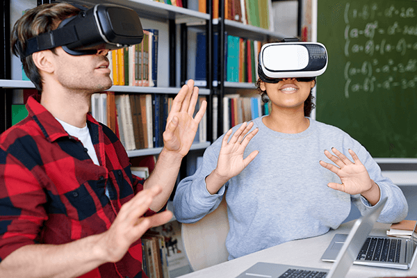 young-astonished-man-and-woman-in-vr-headsets